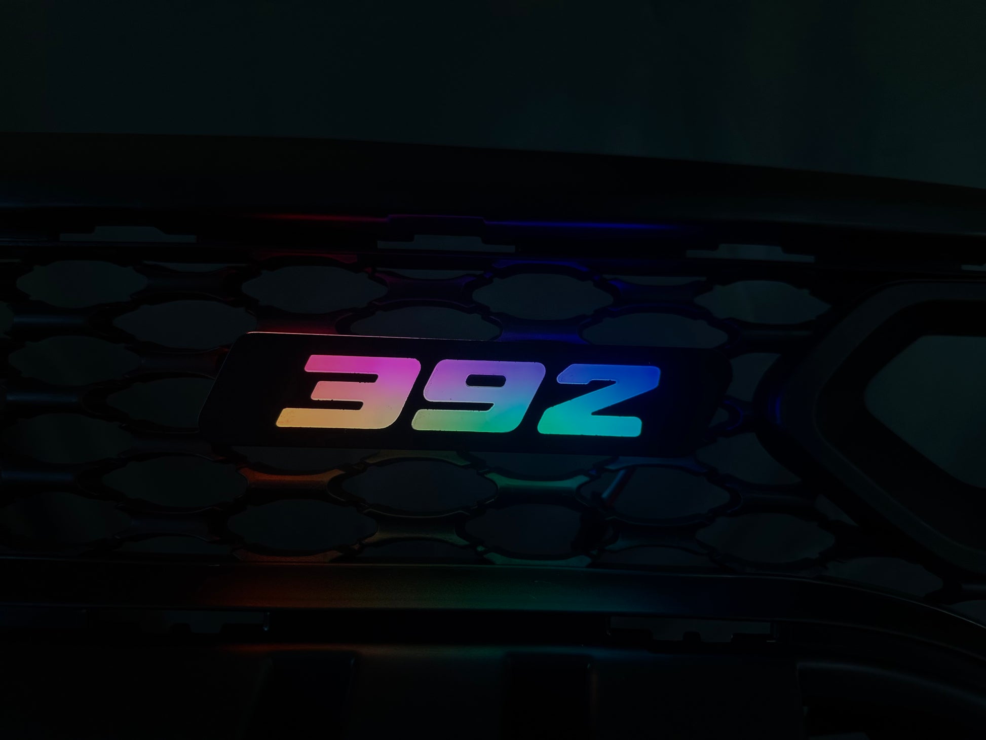 392 Flow Series Grill Badge